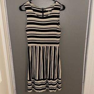 Zipped back brown and white stripped dress in size small!